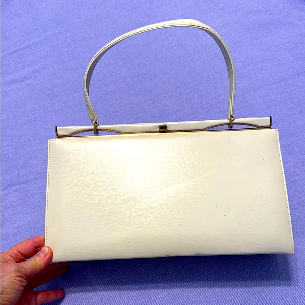 Vintage Theodor purse from the 1950’s.  Never used. Cream leather.